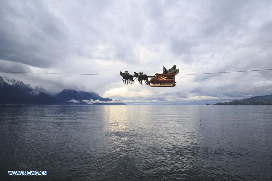 Un Papa Noel “volador” anima el mercado navide?o suizo