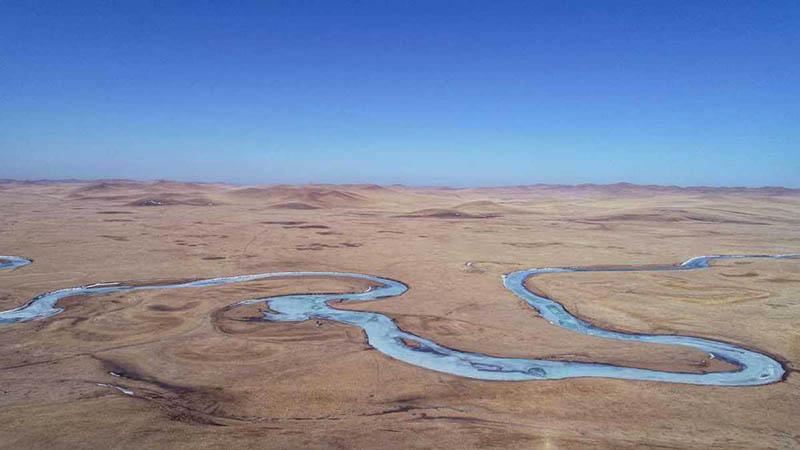 El río Mergel serpentea por la Región Autónoma de Mongolia Interior. [Foto: Bao Wenrui/ Chinadaily.com.cn]